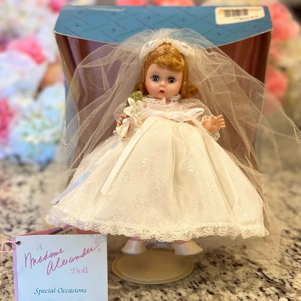 Madame Alexander 8” Bride Model #10392.  Blonde with blue eyes. Includes garter